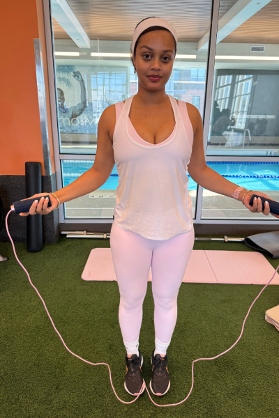 shauna beni haynes holding stakt weights jump rope