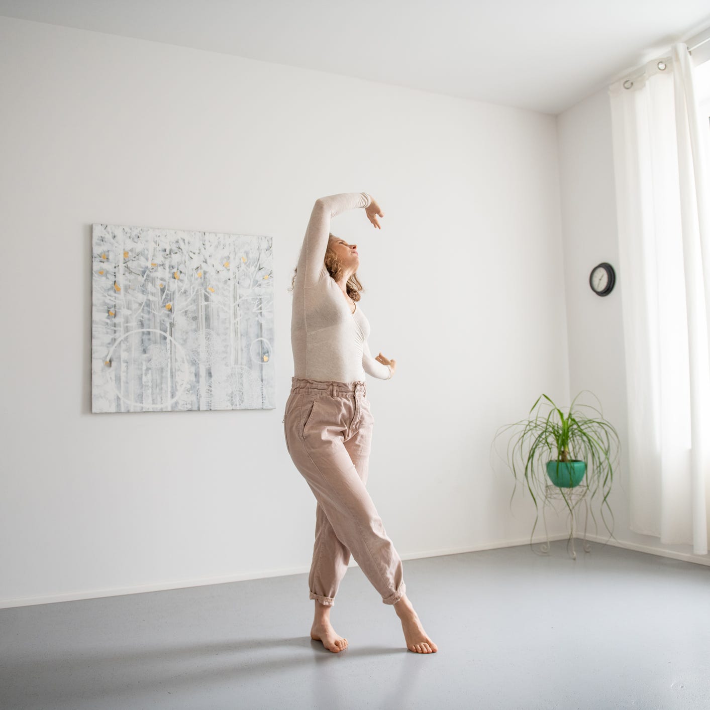 Woman doing relaxation move exercises at home woman doing relaxation move exercises at home