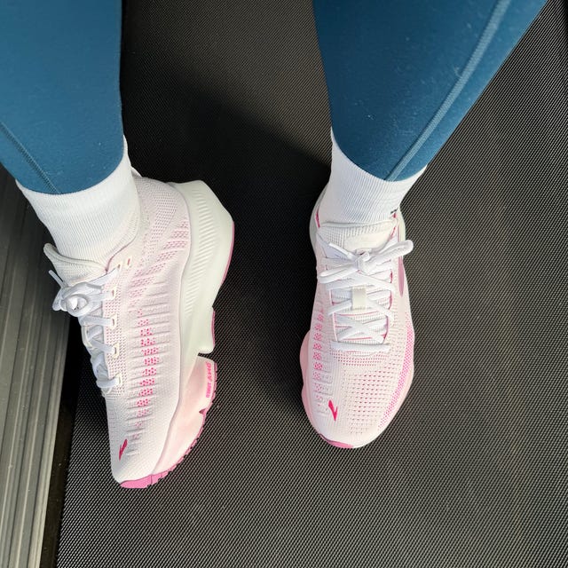 Running shoes on a treadmill surface Running shoes on a treadmill surface