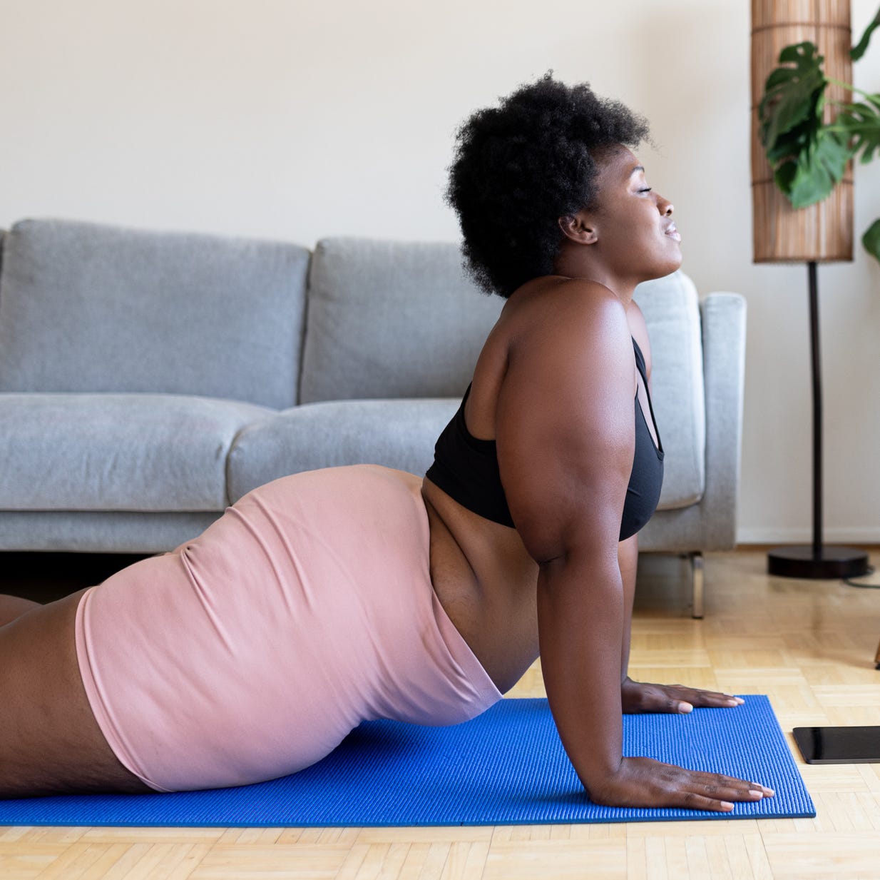 woman doing yoga exercise at home