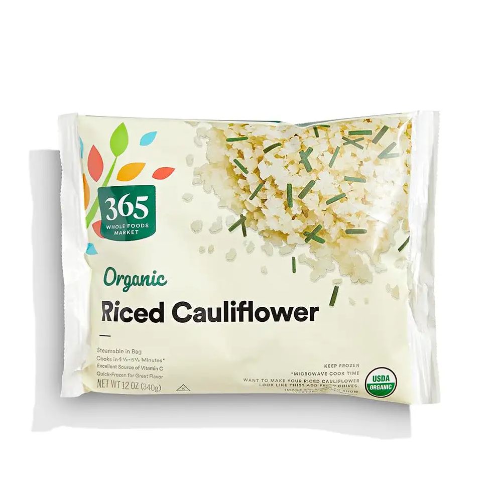 Packet of rived cauliflower on a white background